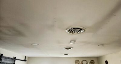 Mold and ghosting on ceiling.
